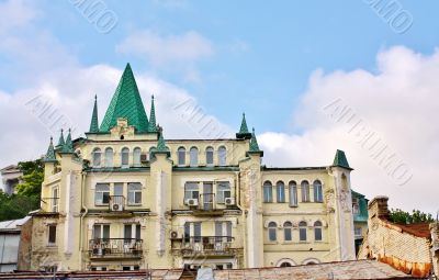 Old house with green turrets 