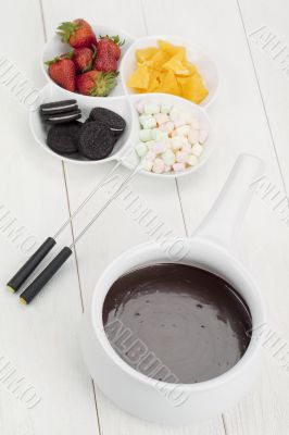 tempting desserts with melted chocolate bowl