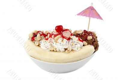 a plate with banana spit and whipped cream top with cherry a plate with banana spit and whipped cream top with cherry