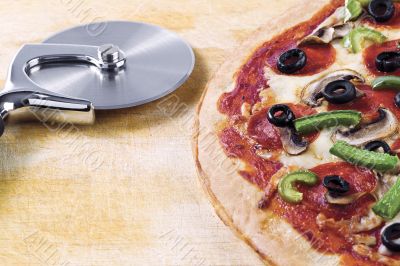 pizza and pizza cutter