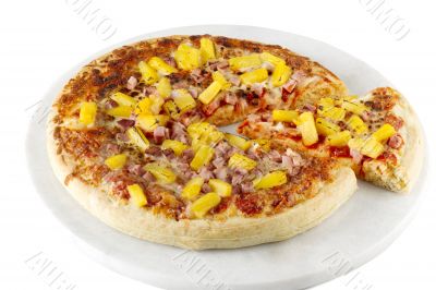 ham and pineapple pizza on a tray