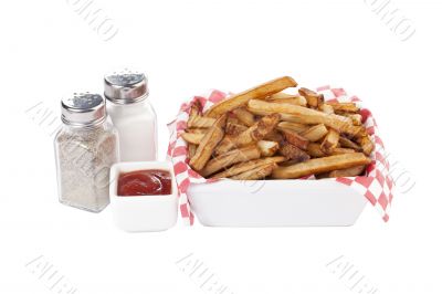 a bowl of french fries with condiments
