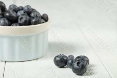 blueberries in white bowl