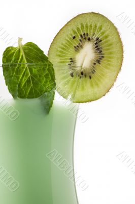 cropped image of kiwi fruit juice glass