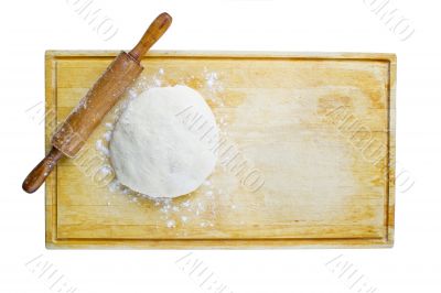 pizza dough and rolling pin on wooden worktop pizza dough and rolling pin on wooden worktop