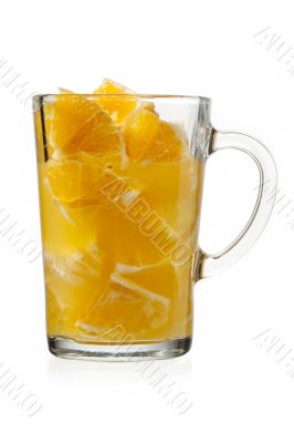 orange pulp and juice in glass