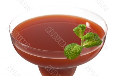 cropped image of strawberry juice in martini