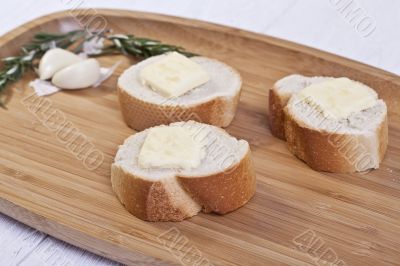 baguette slices with butter