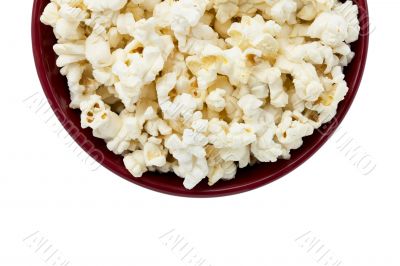 cropped image of a popcorn inside the red bowl 