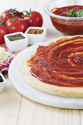 vertical image of pizza ingredients