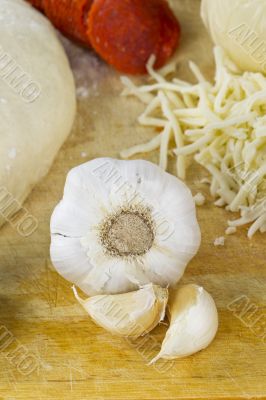 pizza ingredients focusing the garlic 