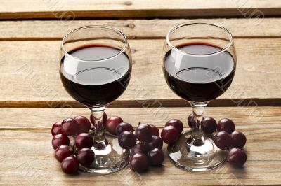 high angle view of wine glass and grapes