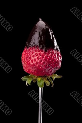 strawberry dipped in chocolate fondue