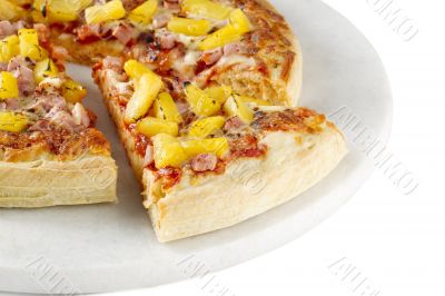 cropped image of hawaiian pizza slices