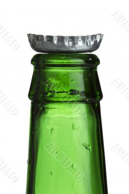 cropped image of a empty green bottle