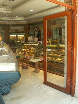 Open the door to the shop, and sweets