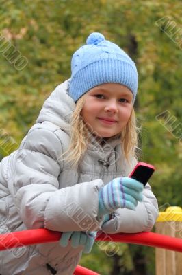 Small girl with cellular phone