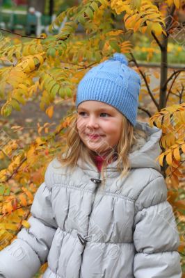 Beautiful girl with blond hair and blue eyes