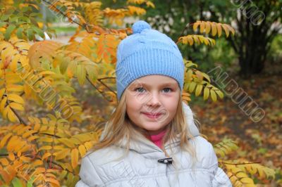 Beautiful girl with blond hair and blue eyes