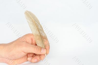 Writing with a piece of feather