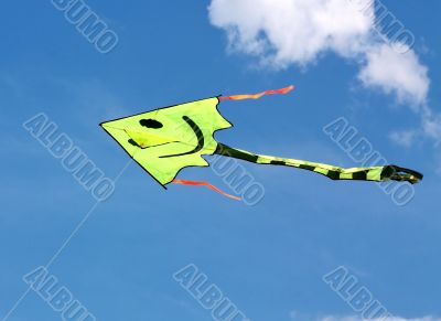 Flying kite in the blue sky