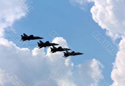 Aerobatic  group on the background of white clouds