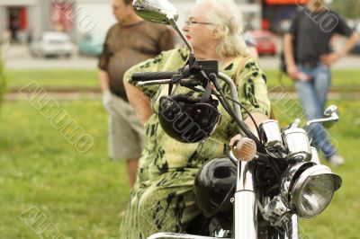 woman and a motorcycle