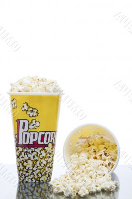 two buckets of popcorn isolated on a white background two buckets of popcorn isolated on a white background