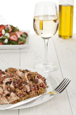 octopus risotto with fork and wine octopus risotto with fork and wine