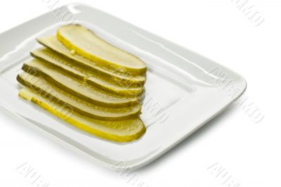 slices of fresh pickles on the plate
