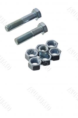 screws and bolts arranged on white screws and bolts arranged on white