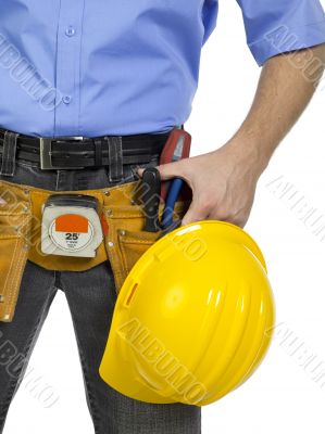 a worker with yellow helmet and construction tools a worker with yellow helmet and construction tools