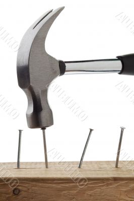 hammering nails on wood