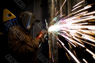 manual worker with metal cutting tool