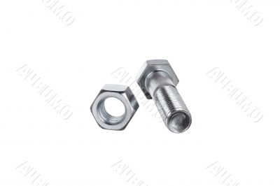 nut beside lying bolt