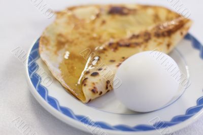 Boiled eggs and pancake