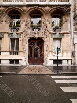 an elaborate door and stone carved building