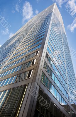 low angle shot of tall commercial building