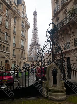 eiffel tower through buildings