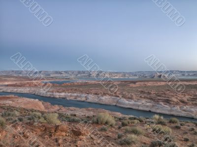 mountain range and river with clear sky in background