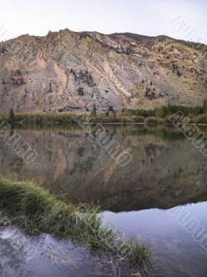 reflection of mountain on lake