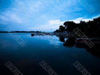 view of pier at dusk