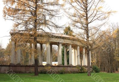 Old-time colonnade among the autumn trees