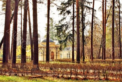 Old-time estate among the autumn trees Old-time estate among the autumn trees