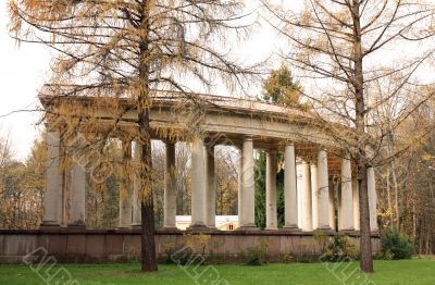Old-time colonnade among the autumn trees