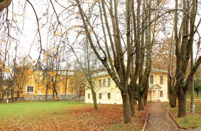 Old-time estate among the autumn trees Old-time estate among the autumn trees