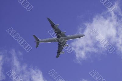 Commercial Airplane in blue sky