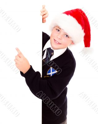 Cute schoolboy waiting for the holidays. Wearing in a school uni