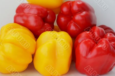 Red and yellow raw pepper