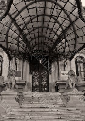 view of statues of lions and steps